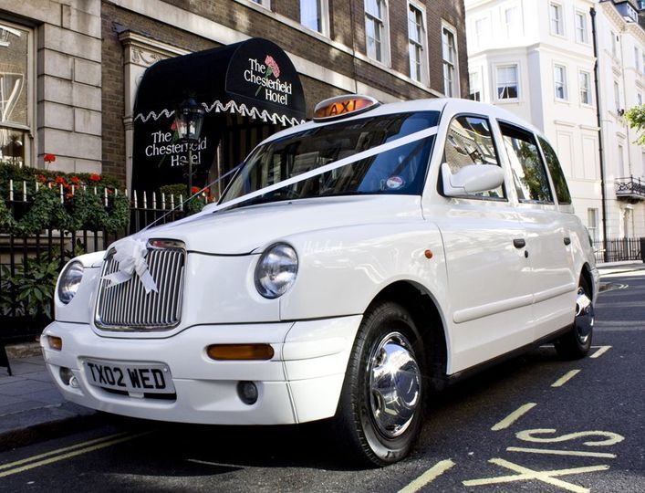 white tour taxi